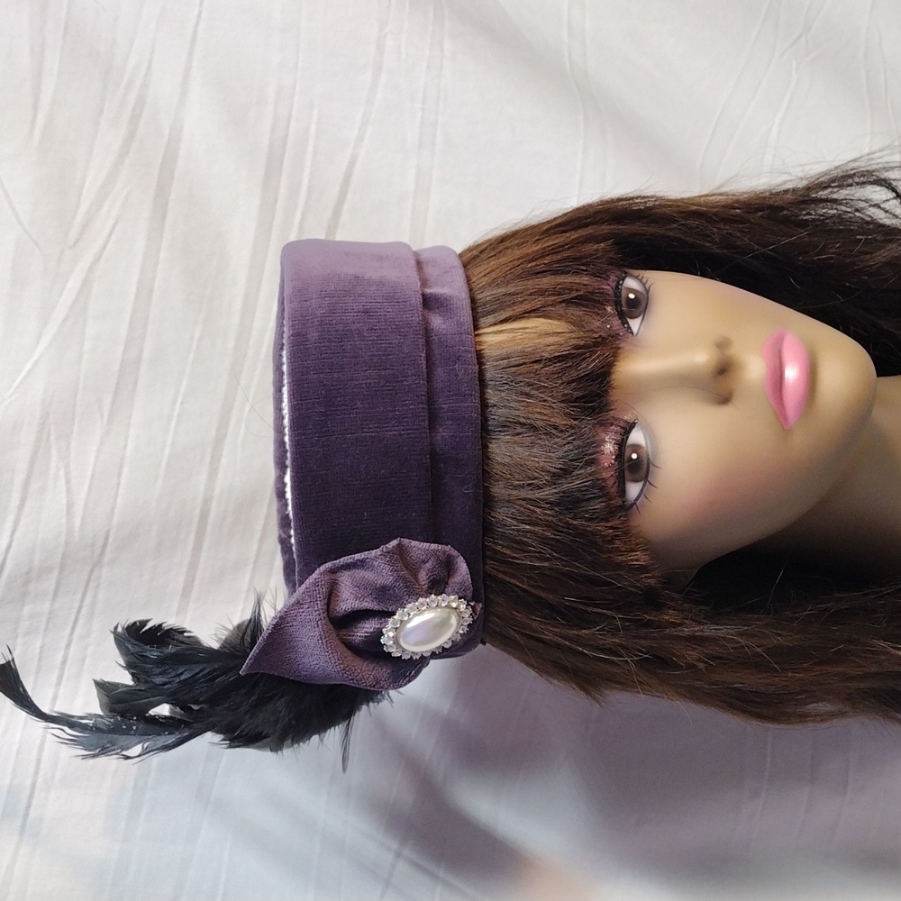 Elegant Velvet Hat with Feather Accent